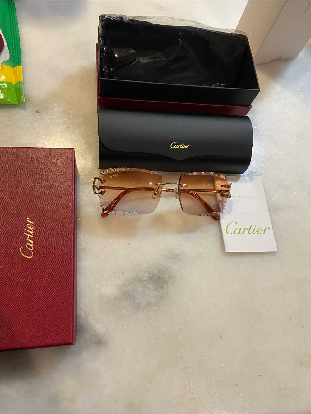 Cartier Women's Rimless Sunglasses in Brown and Gold